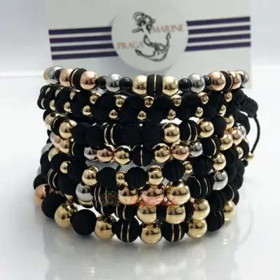 Pulseras en oronlaminado